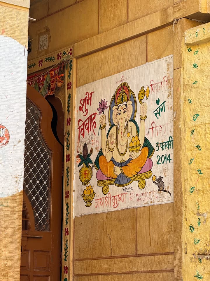 I noticed a lot of these wedding invites painted outside some houses