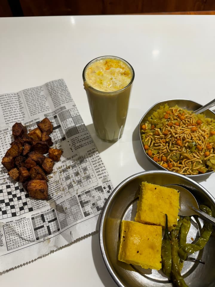 Poha, Khaman, Milk, and that fried sweet potato thingy